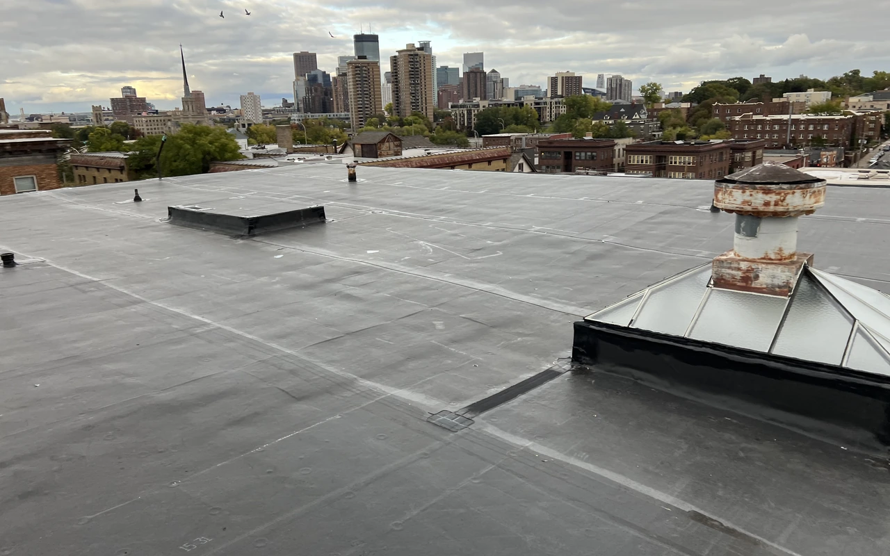 Altus Roofing crew completing a residential project